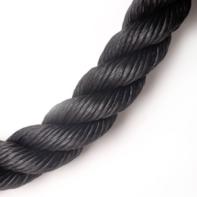 Black tricep rope cable attachment with rubber end grips on dark textured background for home gym strength training